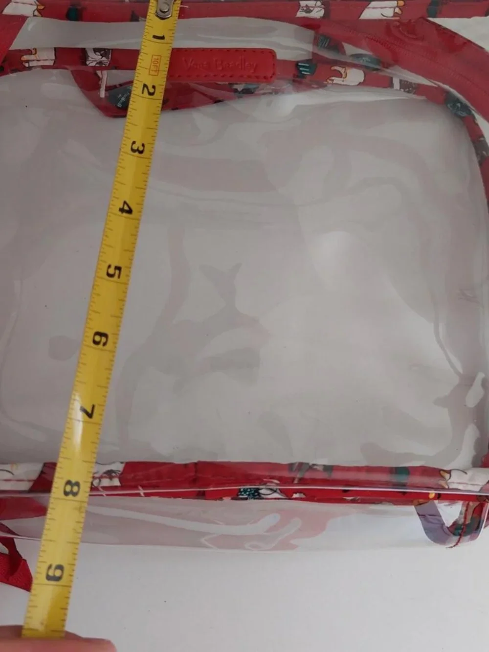Vera Bradley clear makeup cosmetic bag travel features the whimsical 